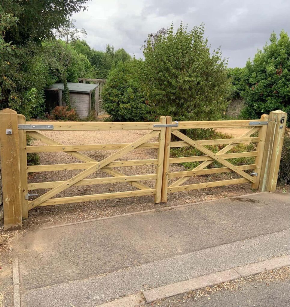 This is a photo of a wooden driveway gate installed by Fast Fix Fencing Holbeach